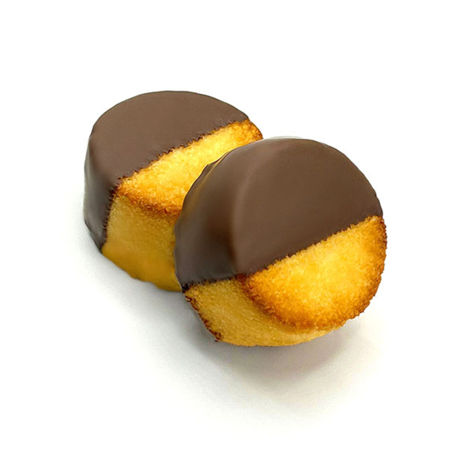 Soft coconut macaroon dipped in the middle on milk chocolate.