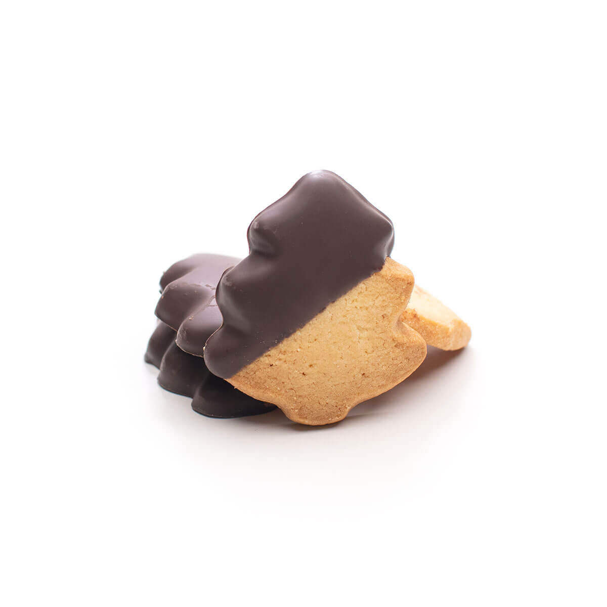 A buttery cookie with a Christmas tree shape dipped in dark chocolate.